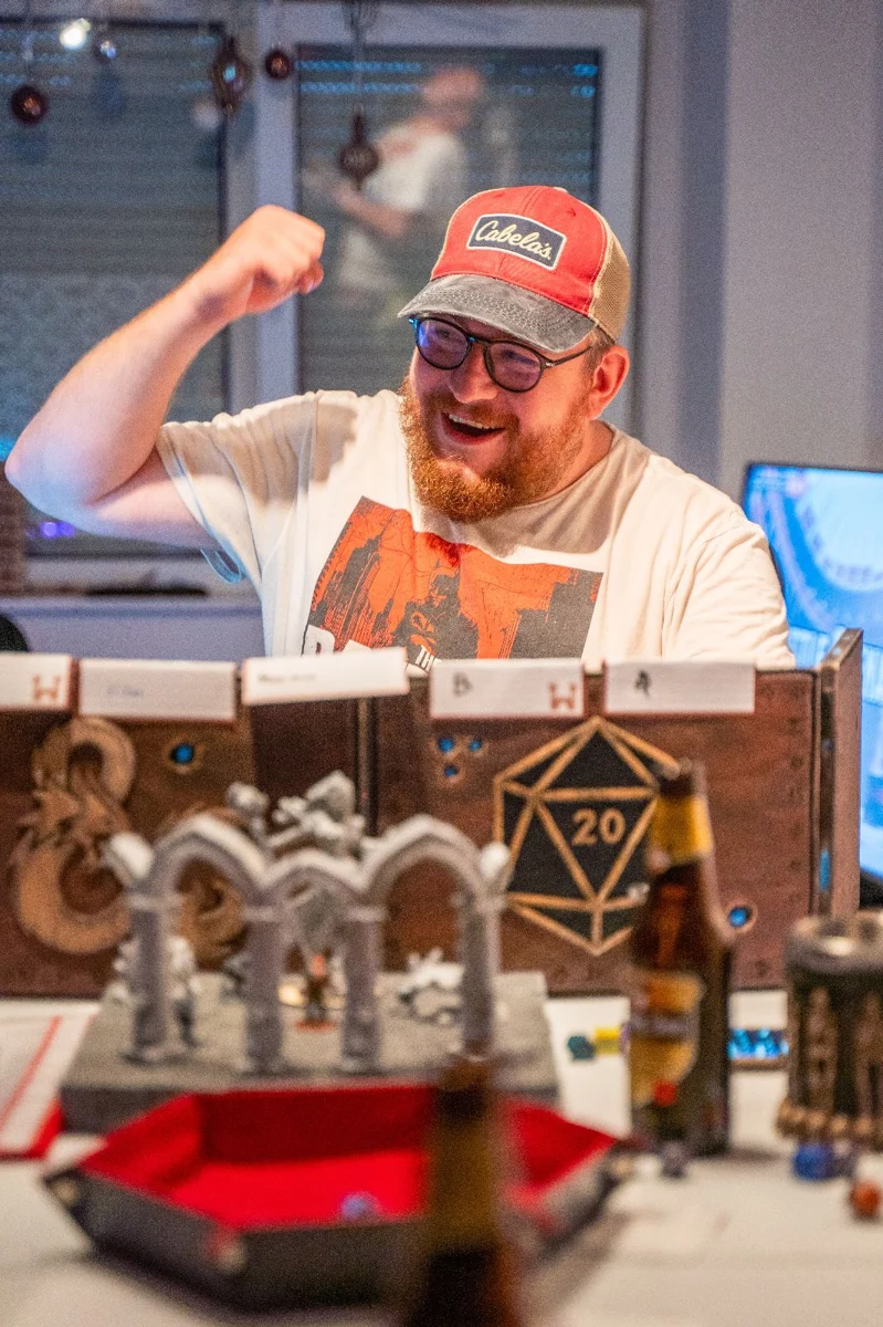 Maikel behind his Dungeon Master screen at the gaming table